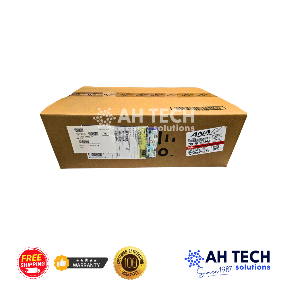 Brown cardboard shipping box with label stickers and barcodes, viewed from the front.